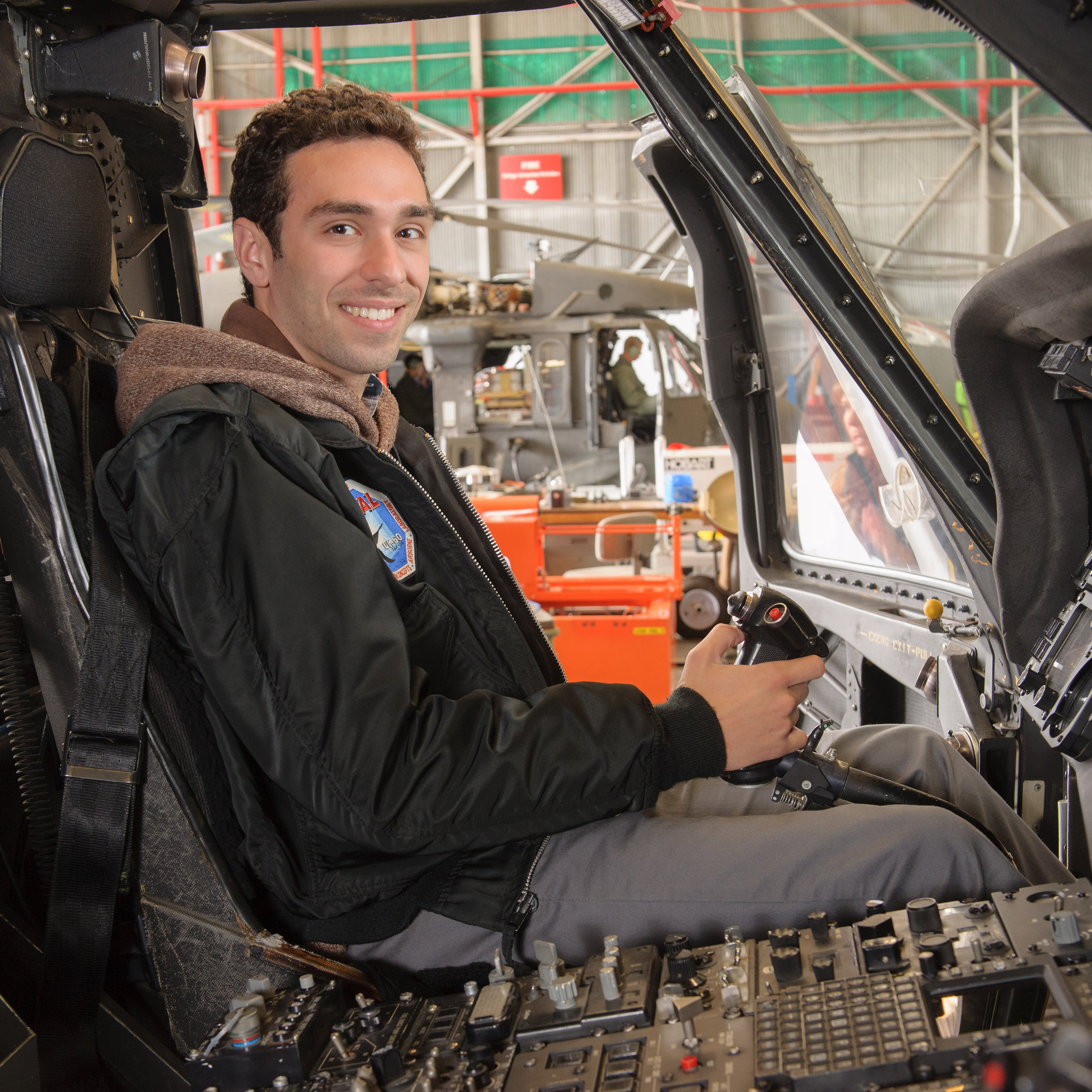 Miles in a Blackhawk cockpit at NASA Ames