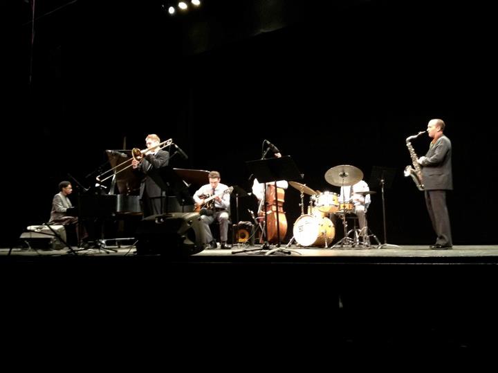 Miles performing with a jazz combo on stage at The Hartt School