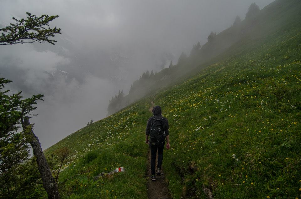 Hiking into the mist in the Swiss Alps